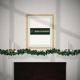 The Medal Wall over a mantel dressed for Christmas
