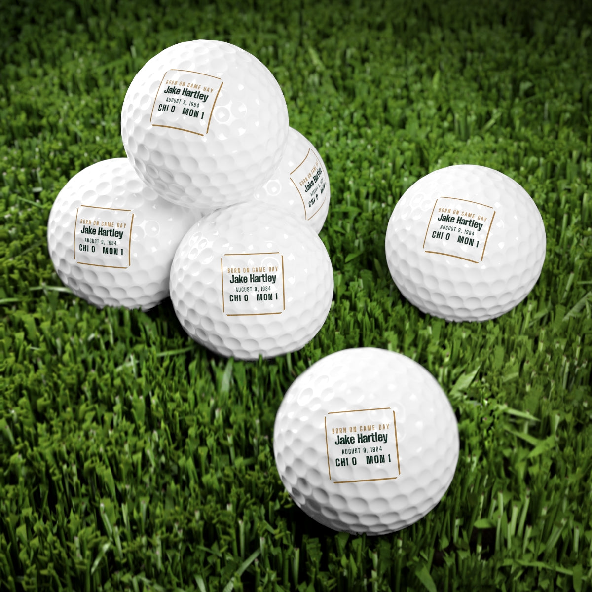 Golf balls with a personalized box score design