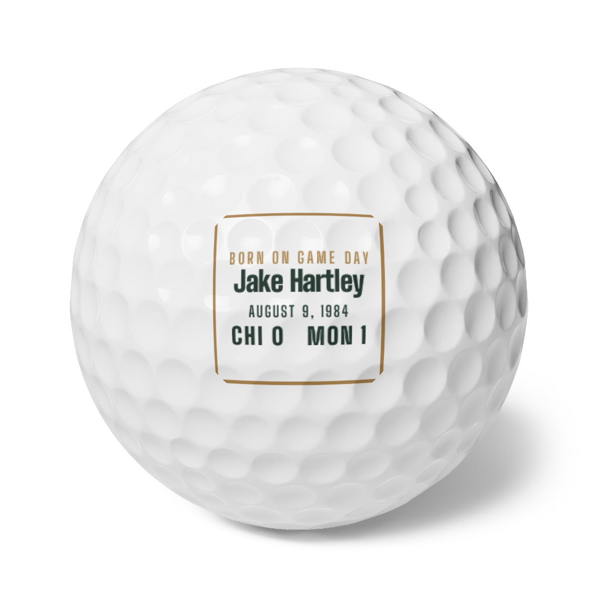 Golf balls with a personalized box score design