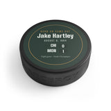 Hockey puck with a personalized box score design
