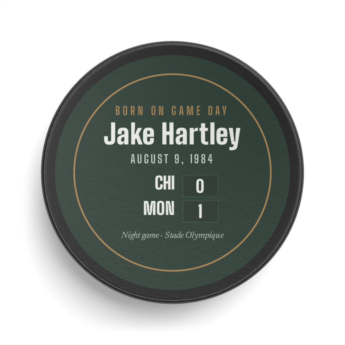 Hockey puck with a personalized box score design