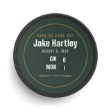 Hockey puck with a personalized box score design